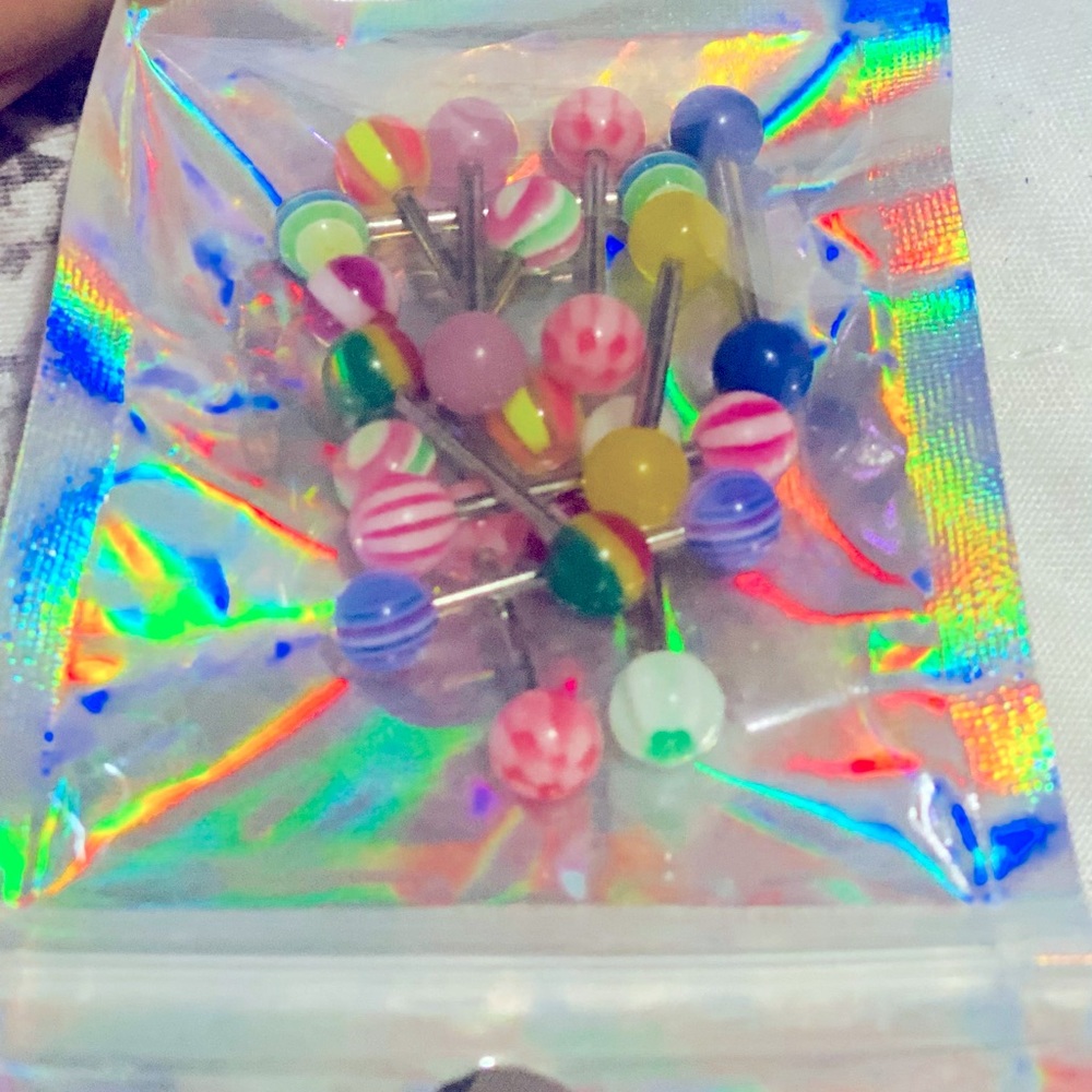13 barbell tongue Rings
